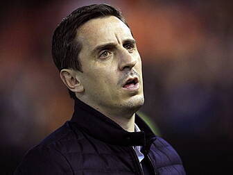 Gary Neville stands firm under...
